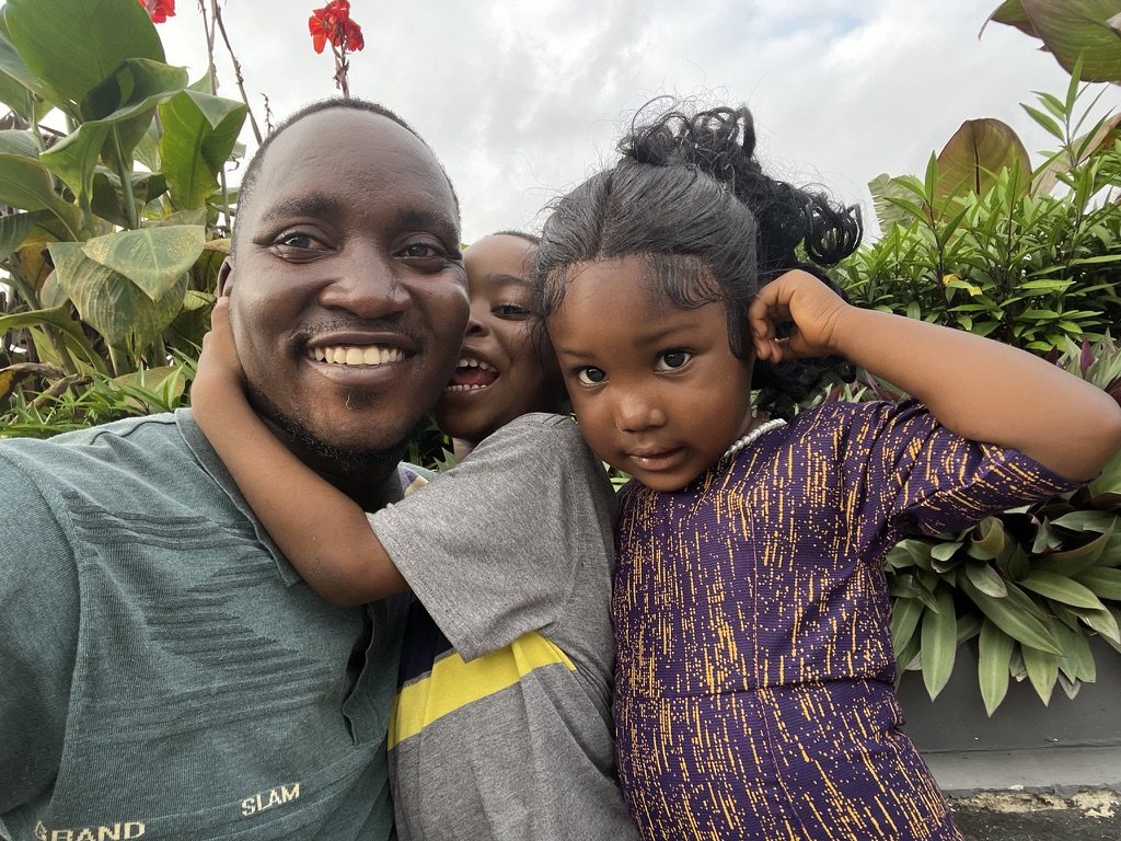 Emmanuel with his children and family